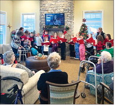 Kewaskum Boy & Girls Club Members  Spread Christmas Cheer at K.M.G.